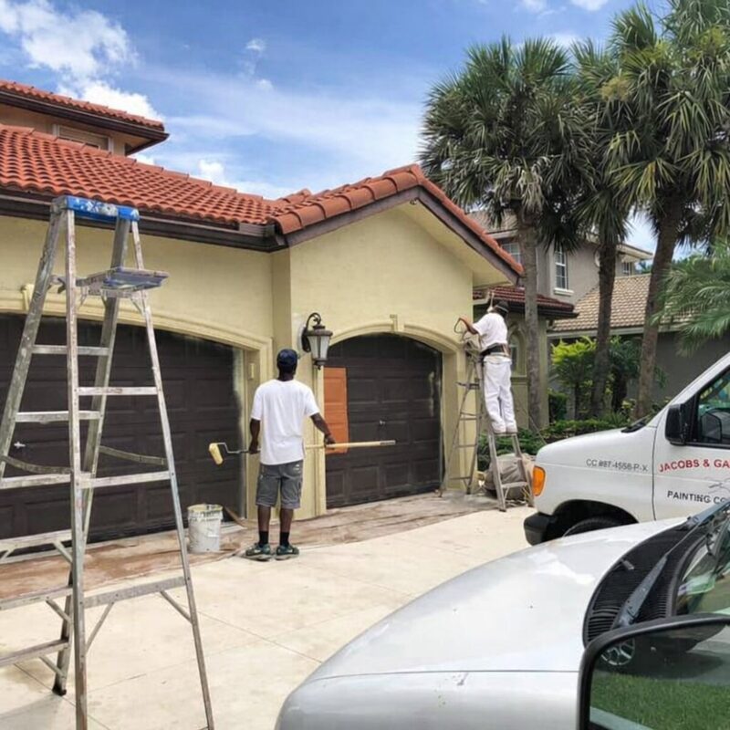Jacobs and Gallucci painting crew working on residential exterior